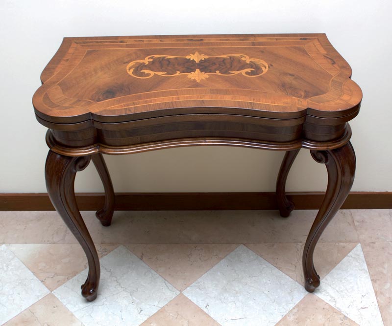 Console in walnut with inlays