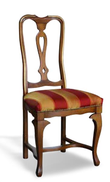 Walnut chair with details in gold leaf